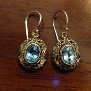 2 Carats Oval Blue Topaz set in 925 Silver